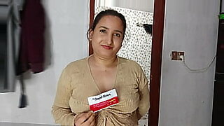 Babe-pissing-into-a-container-for-a-pregnancy-test