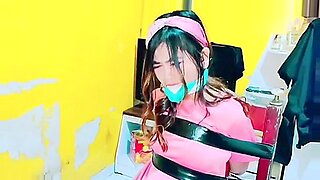 naughty brunette nurse gets trussed up and gagged by master