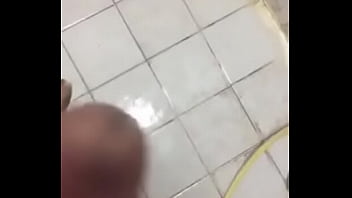 girl hold boys penis to pee