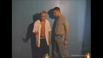 gay suit and tie man fucked by two men